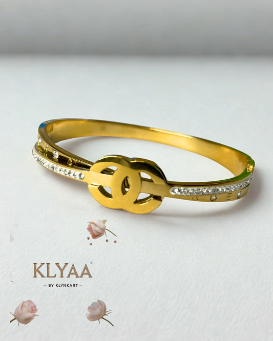 CHANEL-Inspired Interlock Gold Kada – Designer bracelet with diamond accents by KLYAA