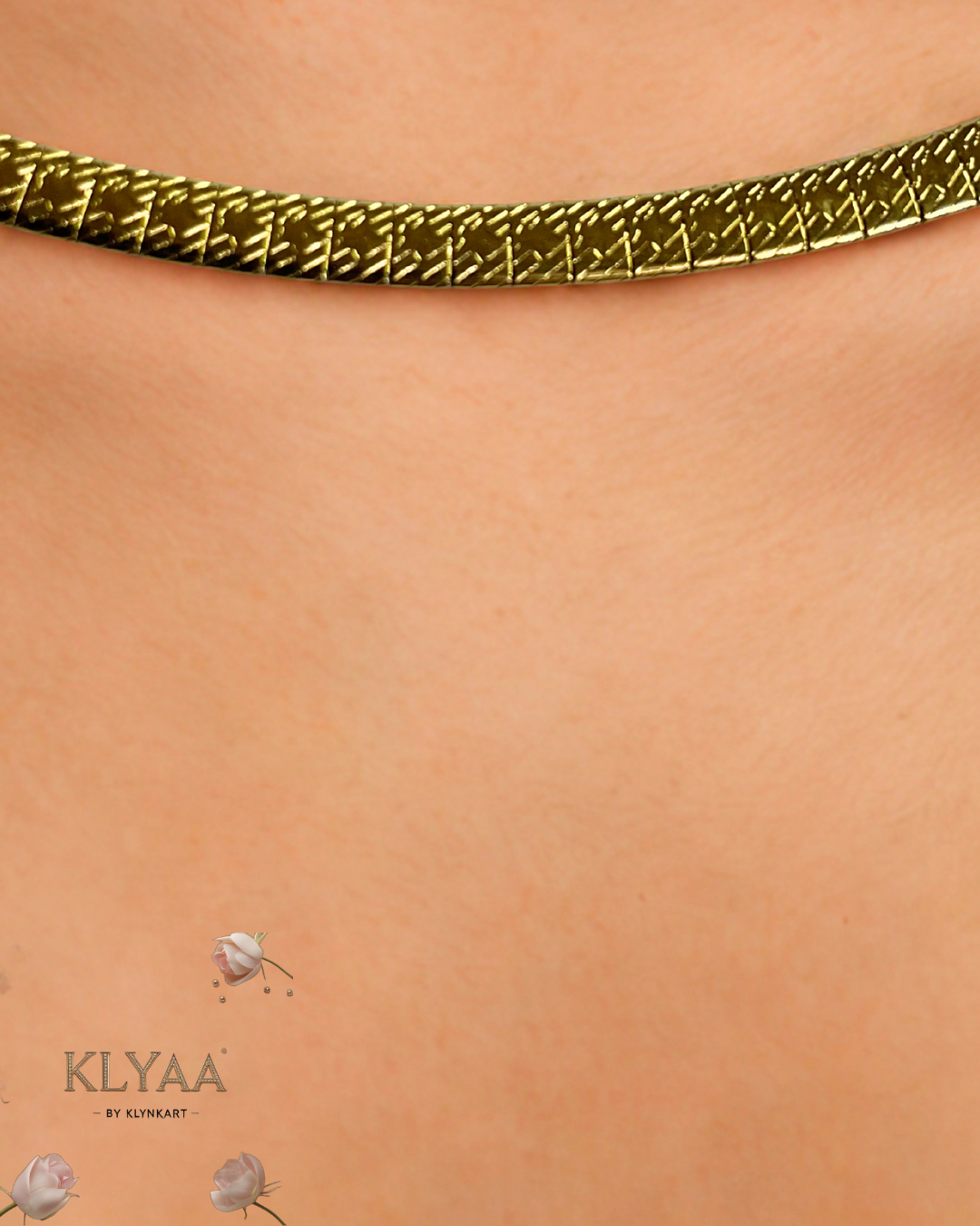 Sleek 18K Gold Plated anti-tarnish huslee neckpiece by KLYAA styled on soft beige fabric