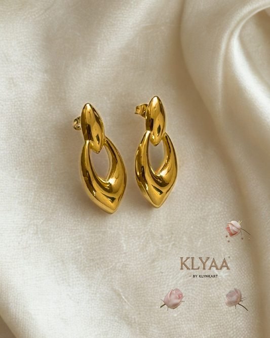 Aurelia Drop Anti-Tarnish sculptural gold drop earrings with a sleek modern design.