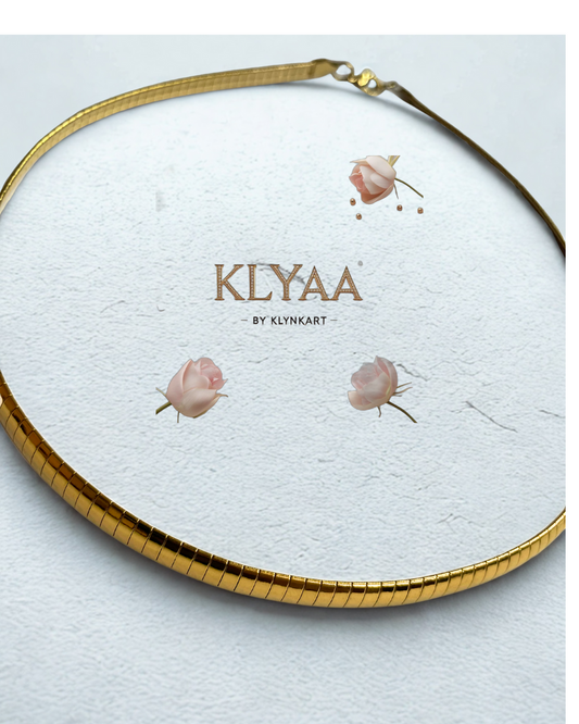 Broad 18K Gold Plated anti-tarnish huslee neckpiece by KLYAA on textured white background
