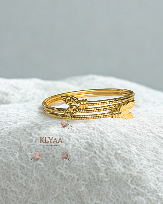 Butterfly Embrace Coil Bracelet – 18K Gold Plated Anti-Tarnish Triple Coil Bracelet with Butterfly Ends by KLYAA