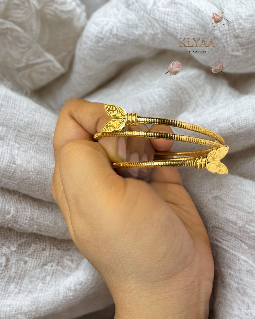 Butterfly Embrace Coil Bracelet – 18K Gold Plated Anti-Tarnish Triple Coil Bracelet with Butterfly Ends by KLYAA