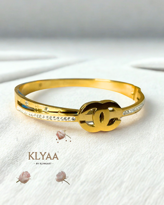 CHANEL-Inspired Interlock Gold Kada – Designer bracelet with diamond accents by KLYAA