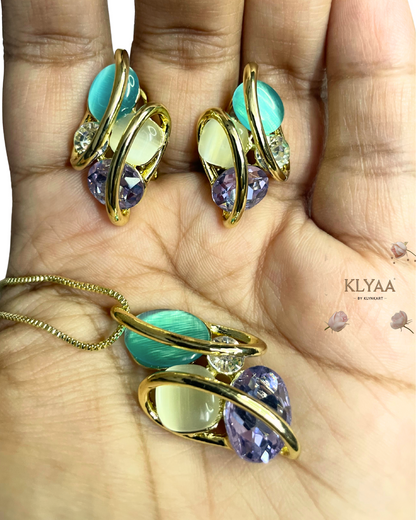 Celestia Flutter butterfly-shaped pendant and earrings with pastel crystals and 18K gold plating by KLYAA, Signature Collection