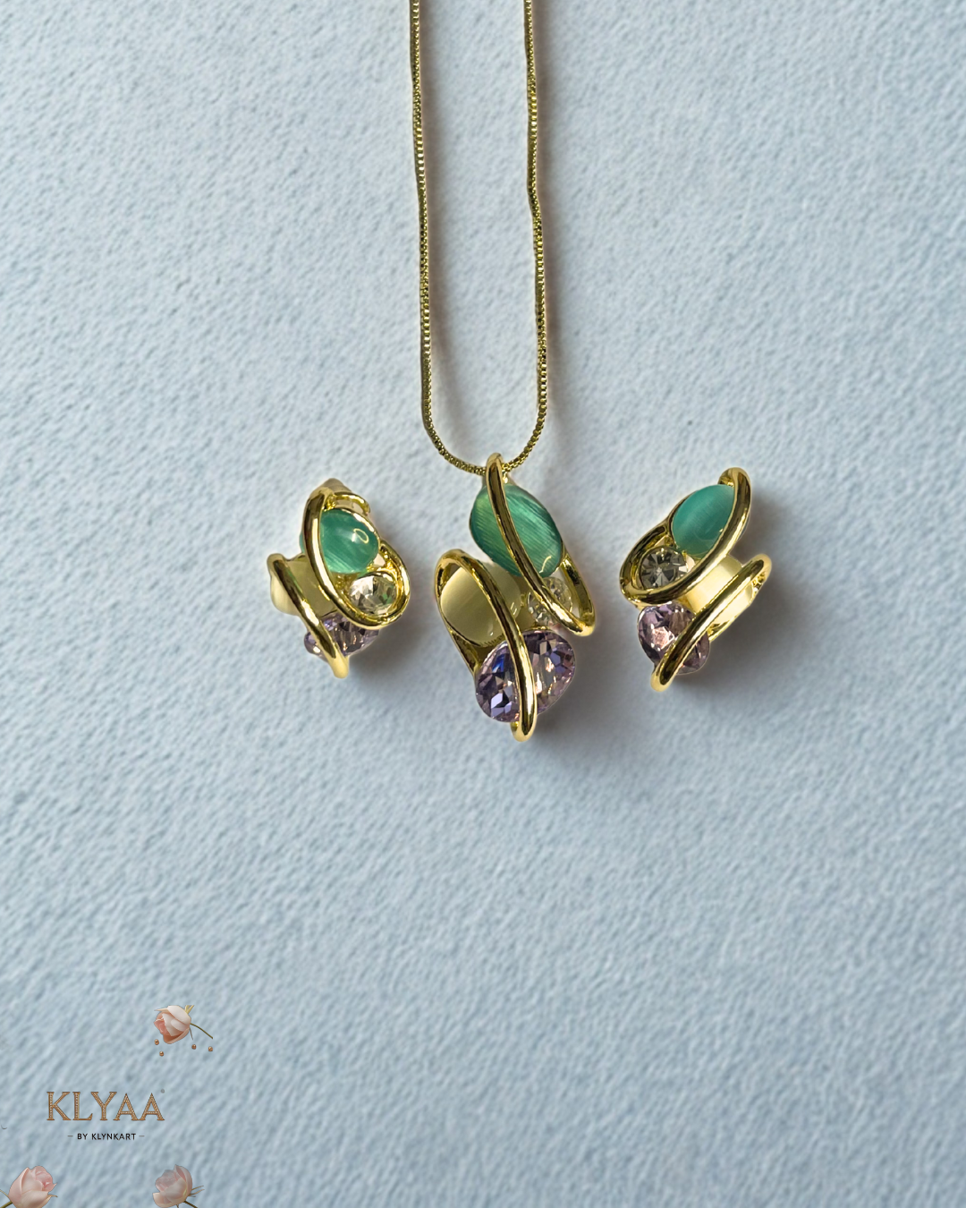 Celestia Flutter butterfly-shaped pendant and earrings with pastel crystals and 18K gold plating by KLYAA, Signature Collection
