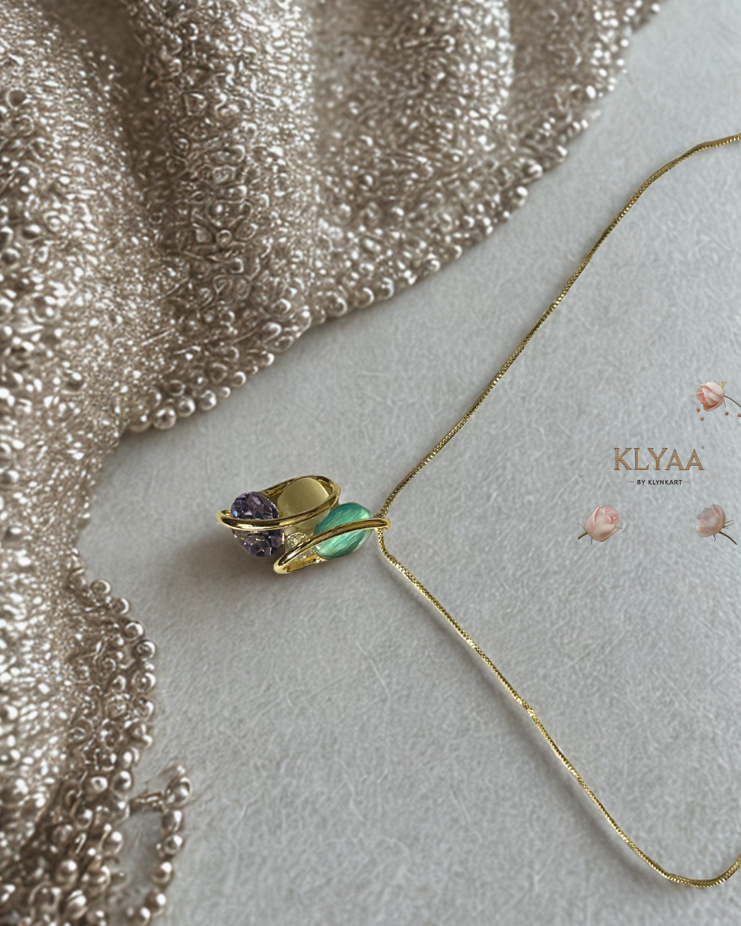 Celestia Flutter butterfly-shaped pendant and earrings with pastel crystals and 18K gold plating by KLYAA, Signature Collection
