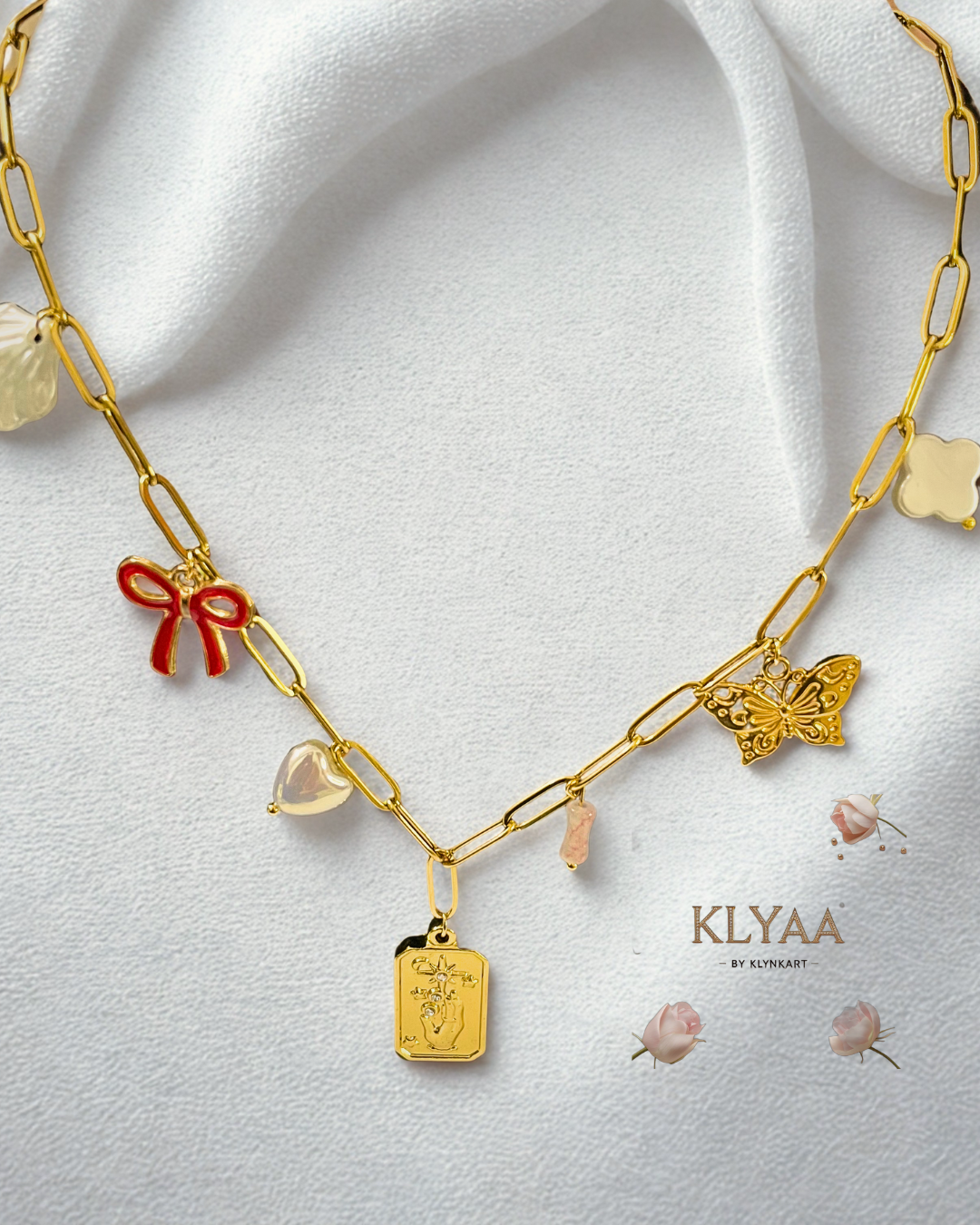 Gold-plated charm necklace with red bow, butterfly, pearls and crest pendant – anti-tarnish chain by KLYAA