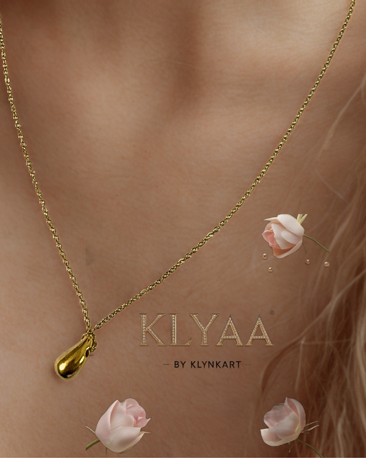 Gold drop pendant chain with anti-tarnish finish by KLYAA, worn against sun-kissed skin.