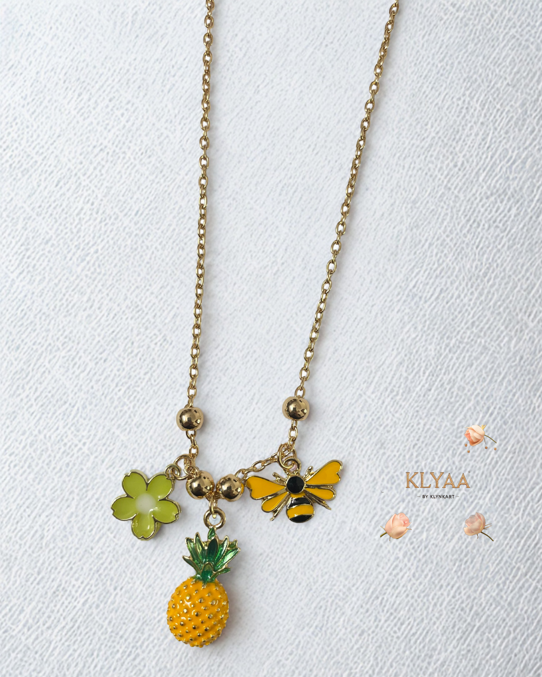 Luxury gold charm chain with pineapple, bee, and flower by KLYAA