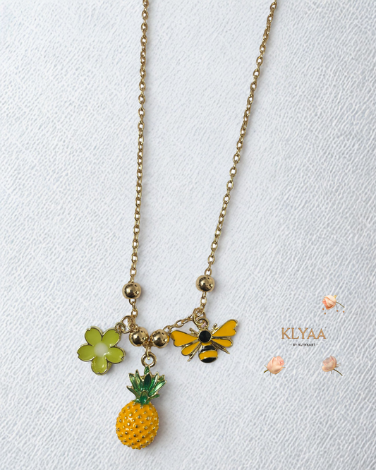 Luxury gold charm chain with pineapple, bee, and flower by KLYAA