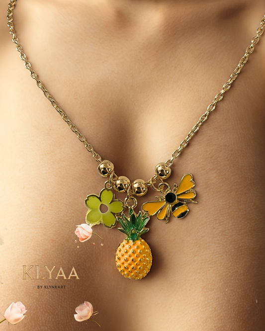 Model wearing KLYAA’s Golden Tropica Charm Chain - luxury charm pineapple chain by KLYAA