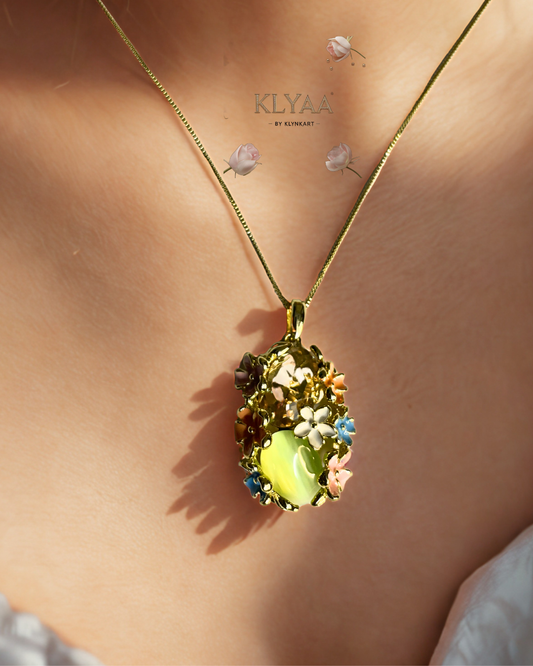 Meadow Muse pendant set with pastel floral crystals and mint green gemstone on anti-tarnish 18K gold dual-tone chain by KLYAA Signature Collection