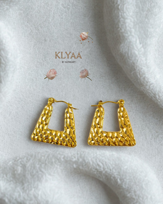 KLYAA anti-tarnish geometric hammered gold earrings on white textured fabric