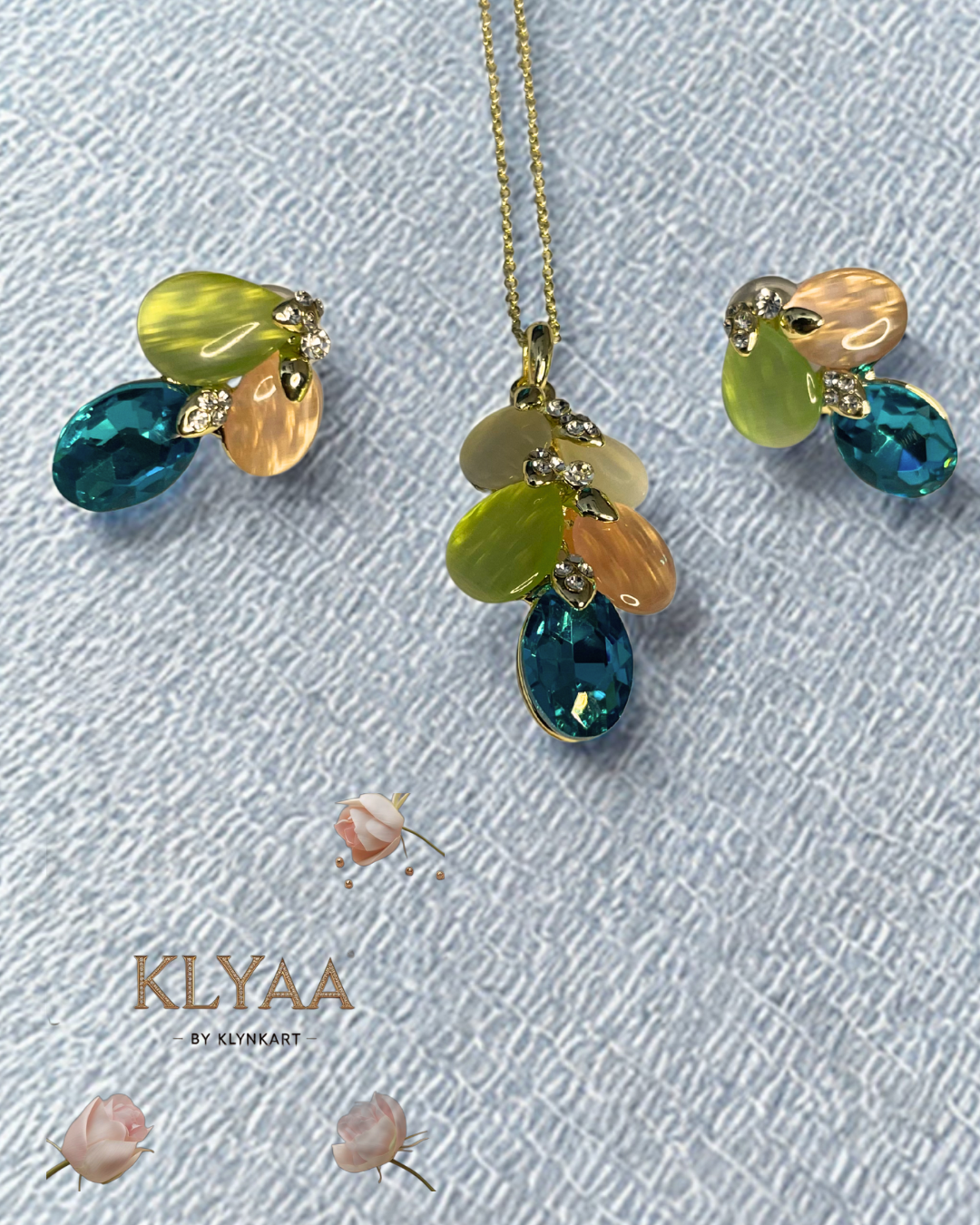 Mystic Bloom Crystal Pendant Set with pastel petals, teal crystal drops and dual-tone chain from KLYAA