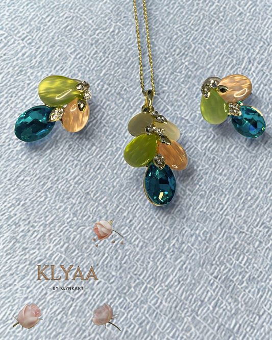 Mystic Bloom Crystal Pendant Set with pastel petals, teal crystal drops and dual-tone chain from KLYAA