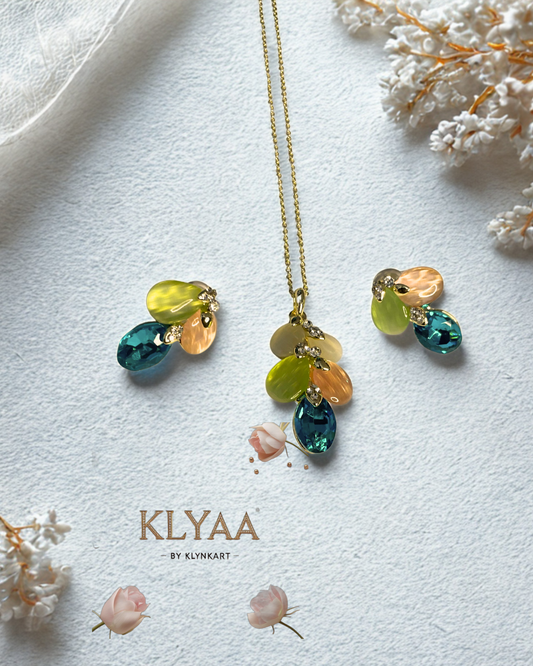 Mystic Bloom Crystal Pendant Set with pastel petals, teal crystal drops and dual-tone chain from KLYAA