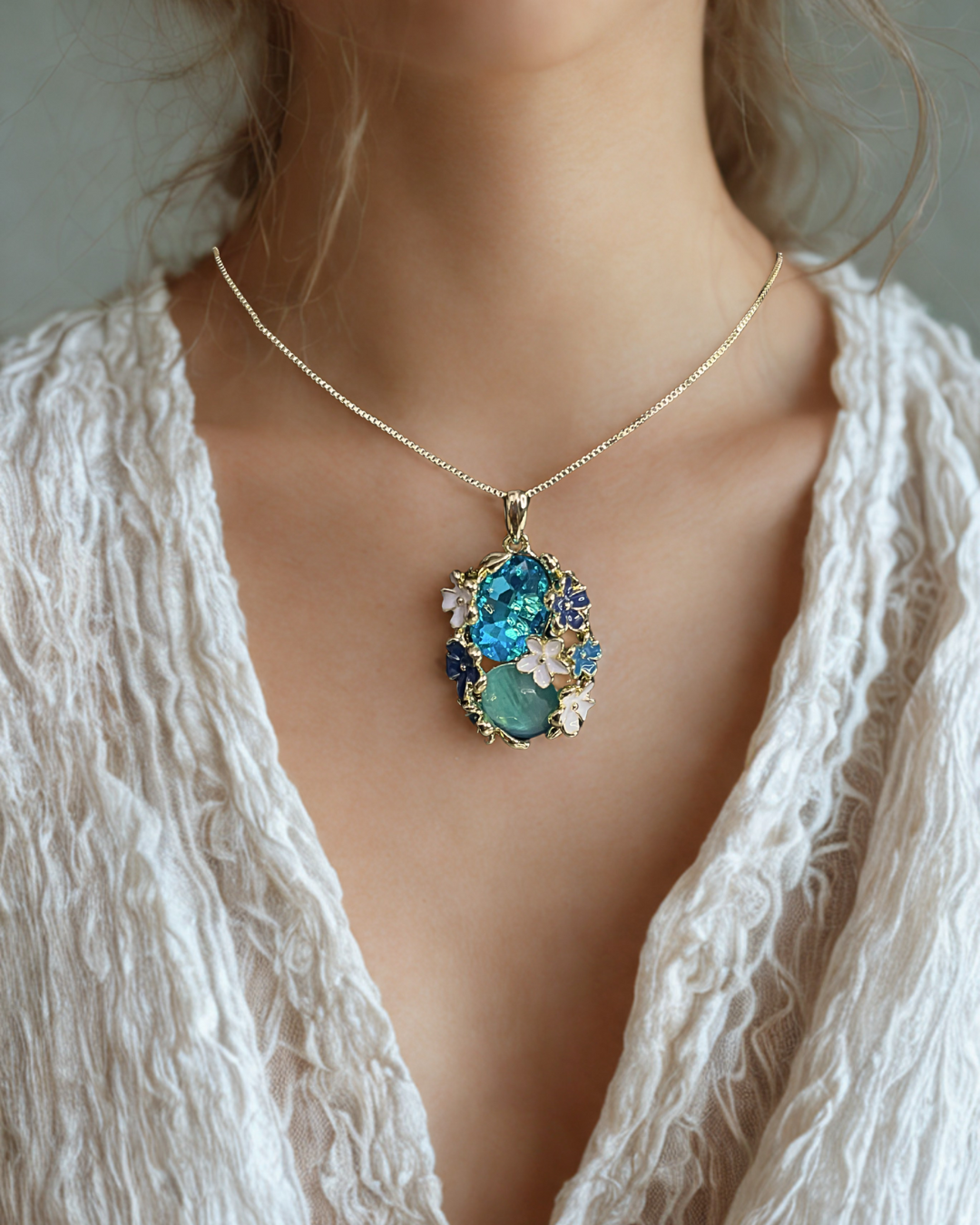 Ocean Empress 18K gold plated crystal floral pendant with dual-tone chain – anti-tarnish finish by KLYAA