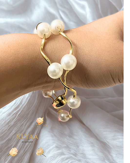 Anti-Tarnish pearl and gold twisted bracelet from KLYAA on hand