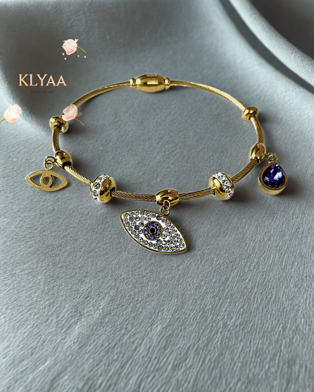 Gold adjustable evil eye anti-tarnish  bracelet with blue enamel and zircon charms – KLYAA
