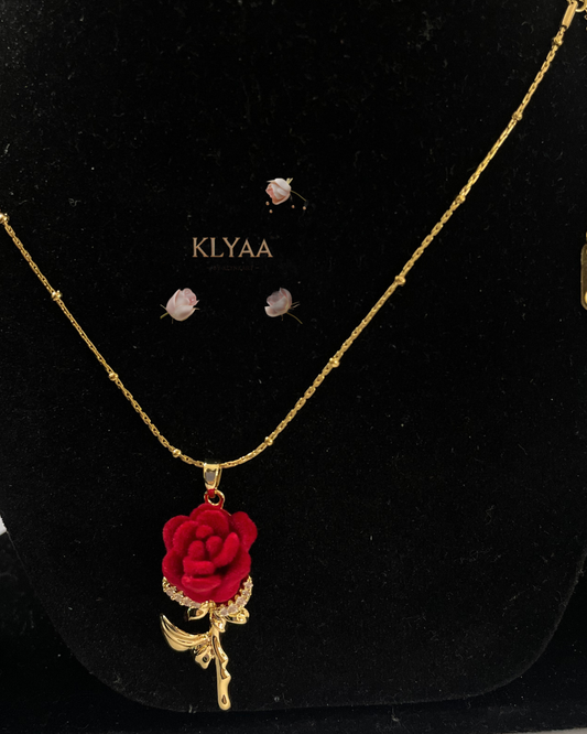 Gold necklace with red velvet rose pendant by KLYAA