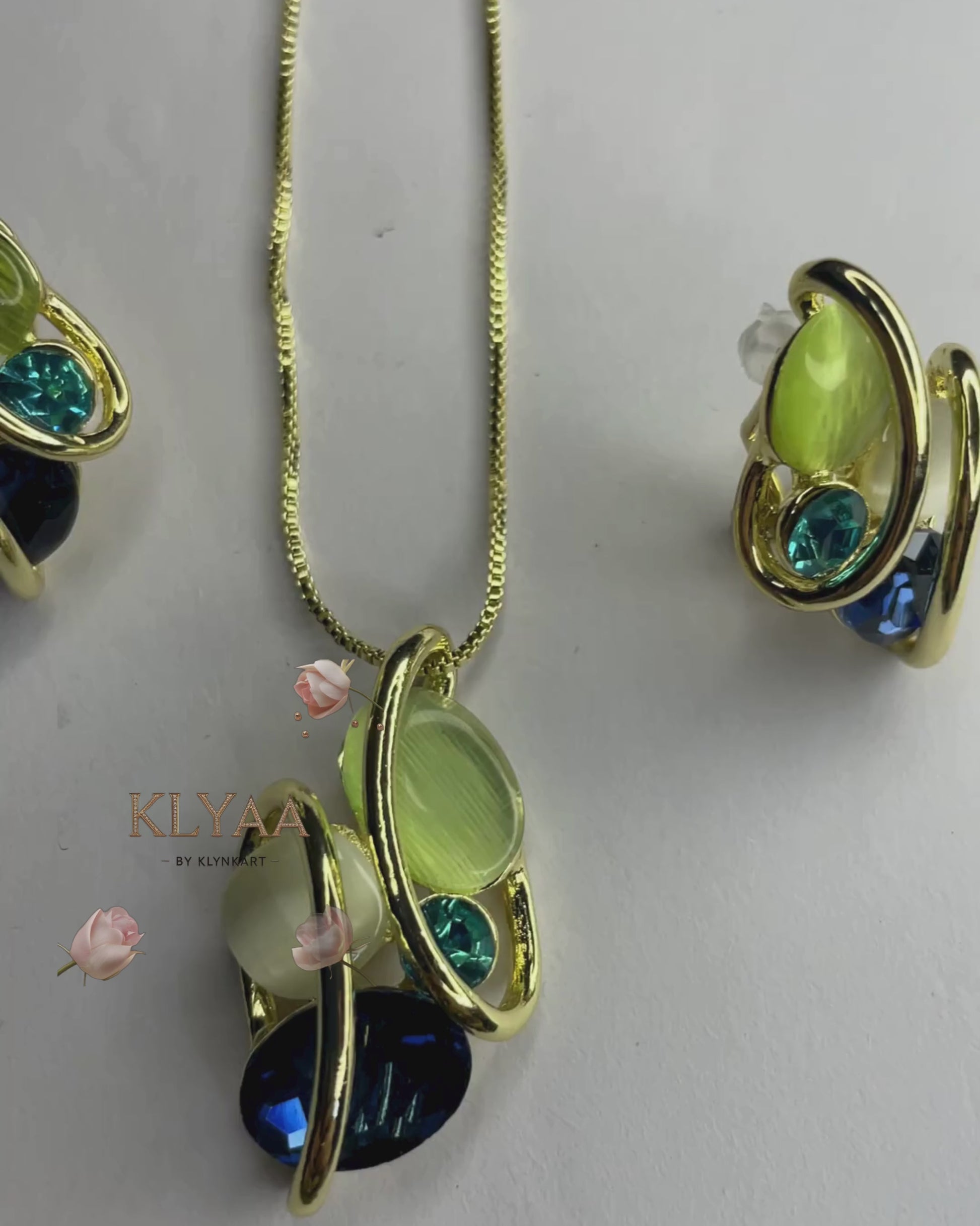 Elysian Swirl crystal pendant set with abstract multi-stone design in dual-tone chain – Signature limited edition jewellery by KLYAA