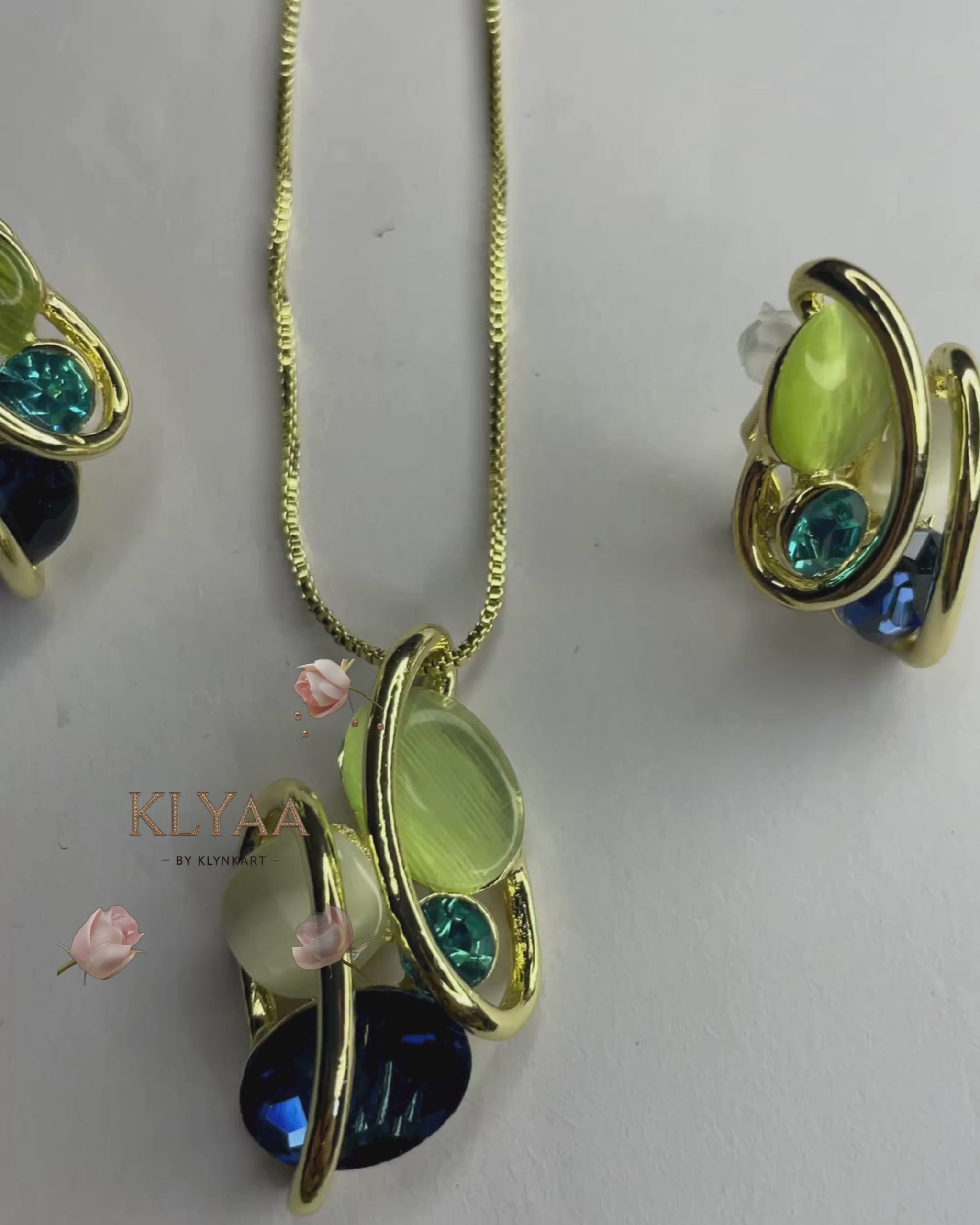 Elysian Swirl crystal pendant set with abstract multi-stone design in dual-tone chain – Signature limited edition jewellery by KLYAA