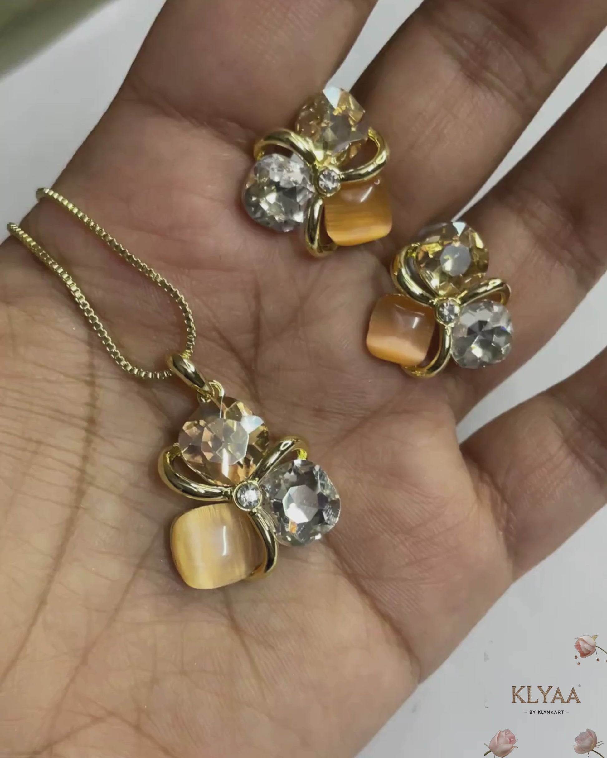 Golden peach crystal pendant set with matching studs, dual-tone anti-tarnish chain, KLYAA Signature Jewellery.