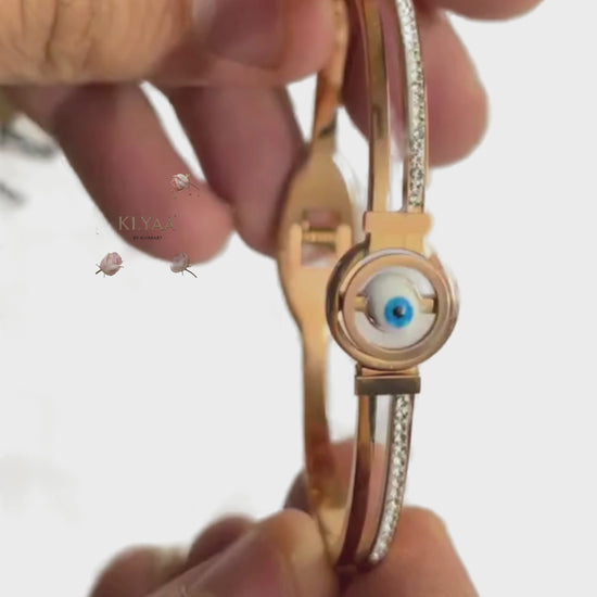 18K Rose Gold Plated Anti-Tarnish Rotating Evil Eye Bracelet by KLYAA