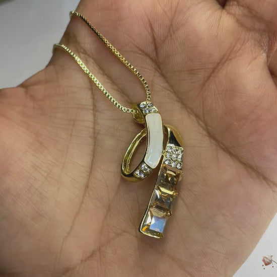 Signature pendant set with champagne and white crystals, dual-tone chain, and gold finish by KLYAA – anti-tarnish limited edition jewellery