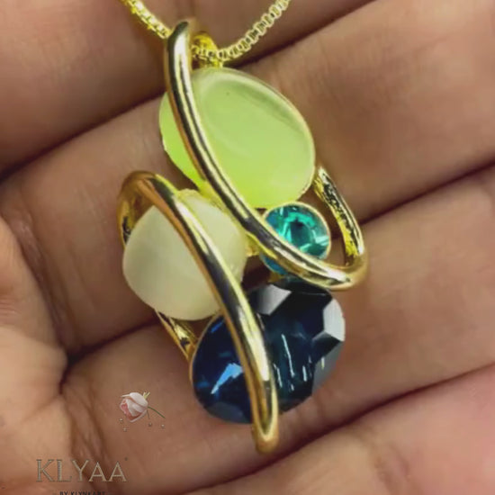 Elysian Swirl crystal pendant set with abstract multi-stone design in dual-tone chain – Signature limited edition jewellery by KLYAA