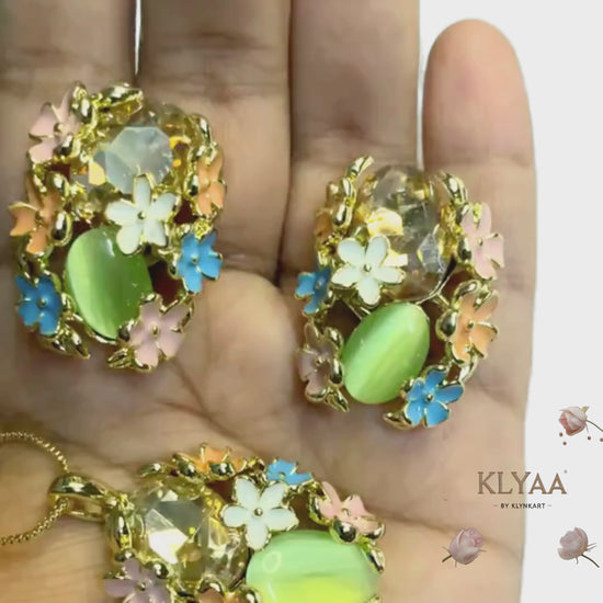 Meadow Muse pendant set with pastel floral crystals and mint green gemstone on anti-tarnish 18K gold dual-tone chain by KLYAA Signature Collection